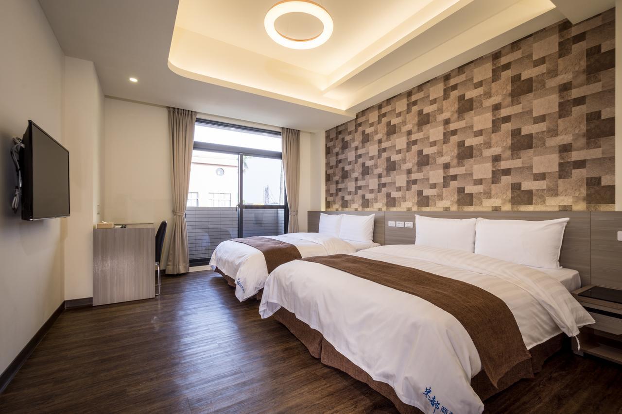 Midu Business Hotel Xiluo Buitenkant foto