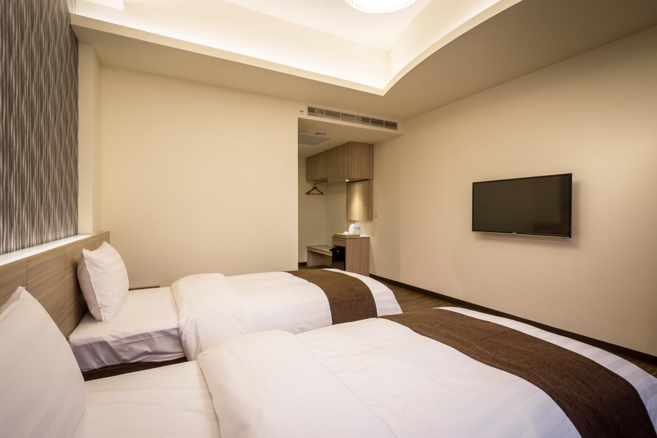 Midu Business Hotel Xiluo Buitenkant foto
