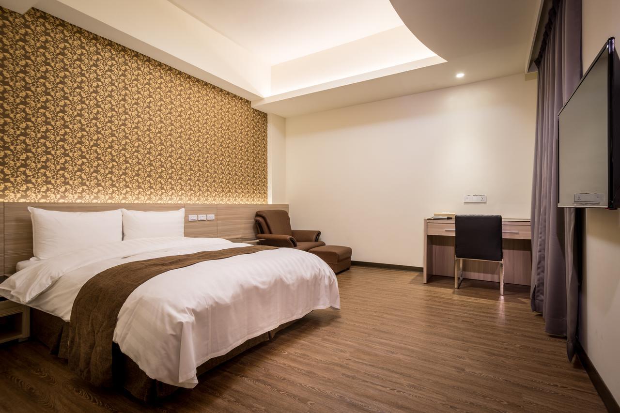 Midu Business Hotel Xiluo Buitenkant foto