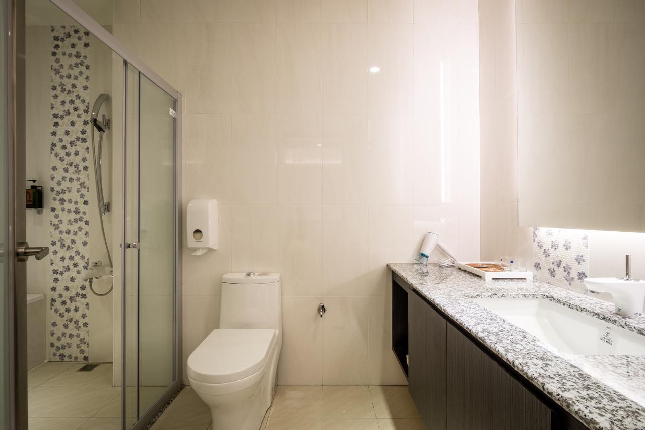 Midu Business Hotel Xiluo Buitenkant foto