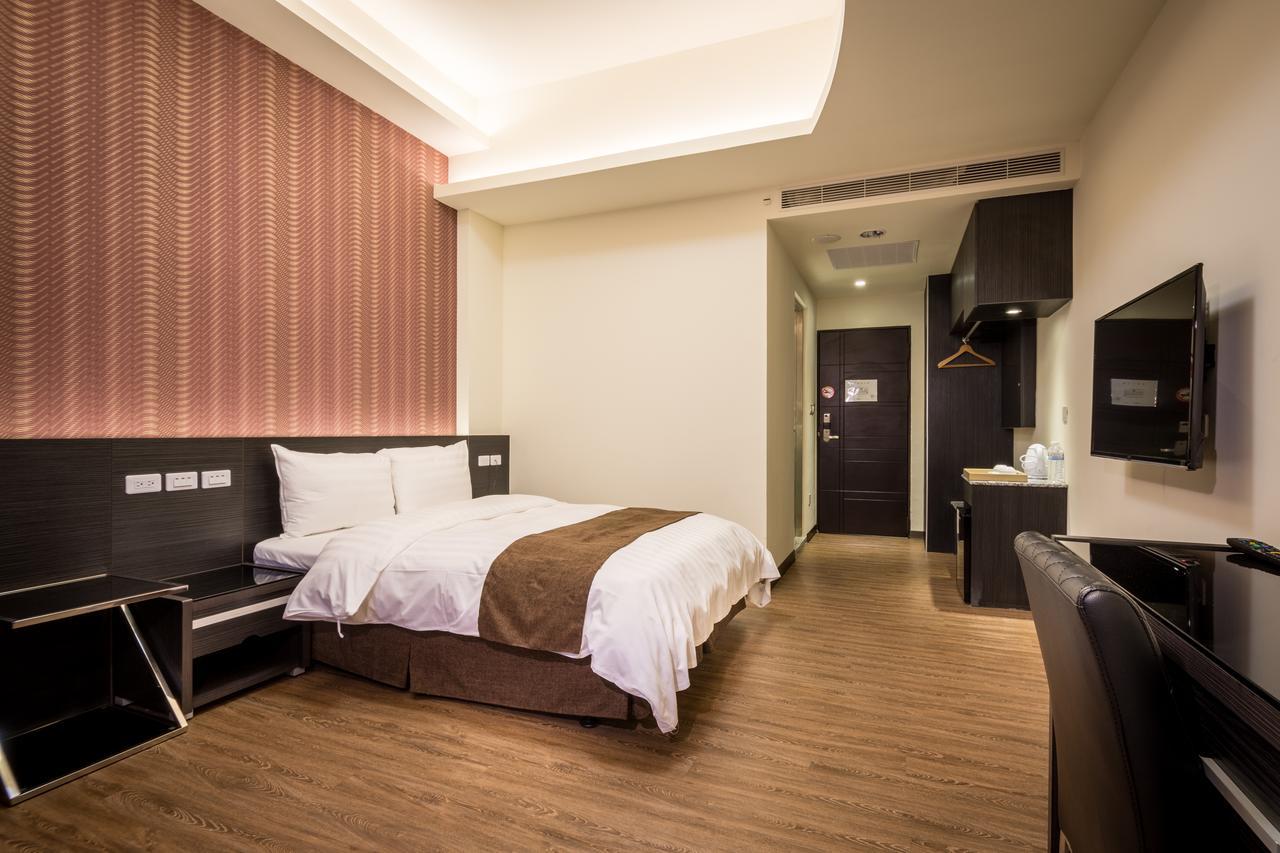 Midu Business Hotel Xiluo Buitenkant foto