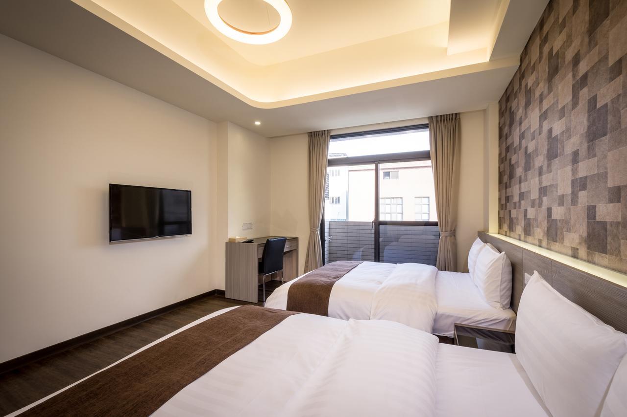 Midu Business Hotel Xiluo Buitenkant foto