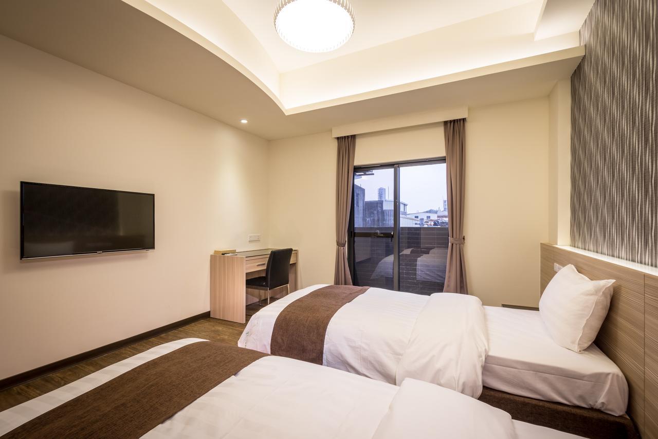 Midu Business Hotel Xiluo Buitenkant foto